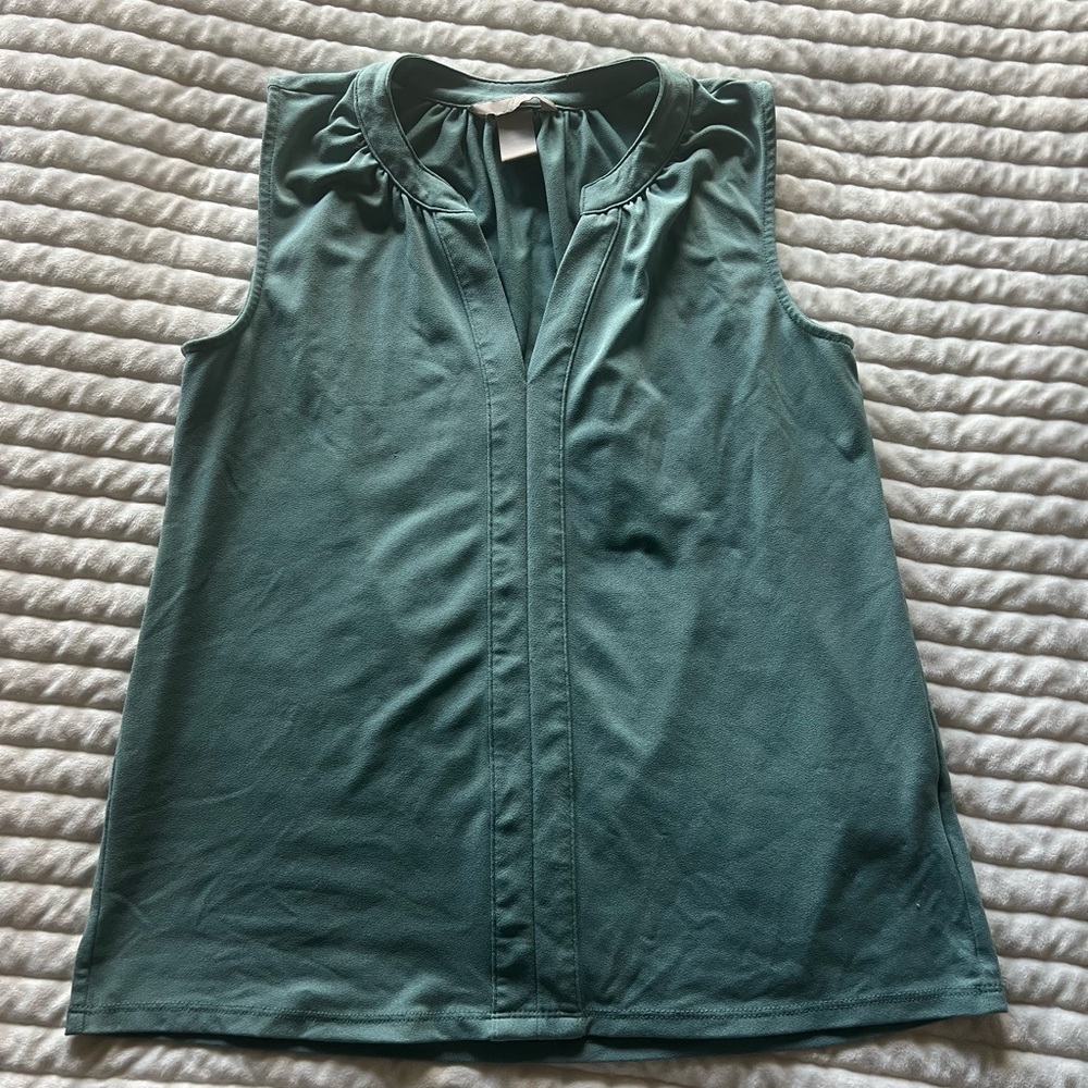Teal sleeveless blouse
